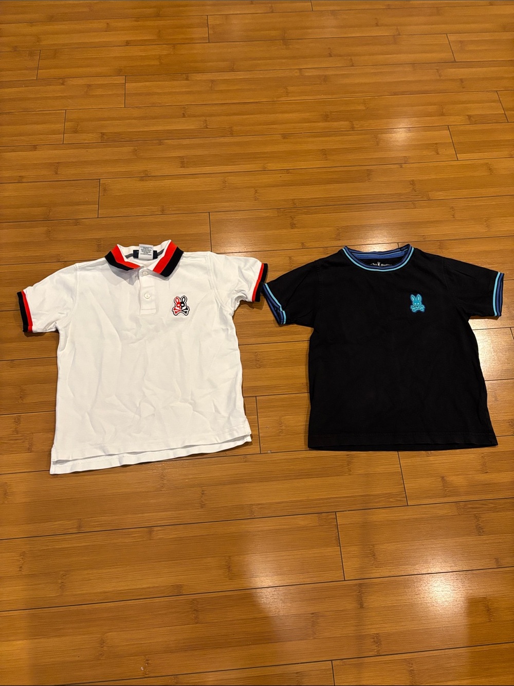Psycho Bunny White Polo with Red & Black Trim + Black Tee with Blue Trim